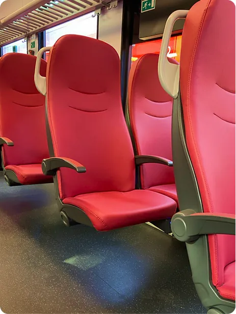 Detail of red seat modules with grey armrests