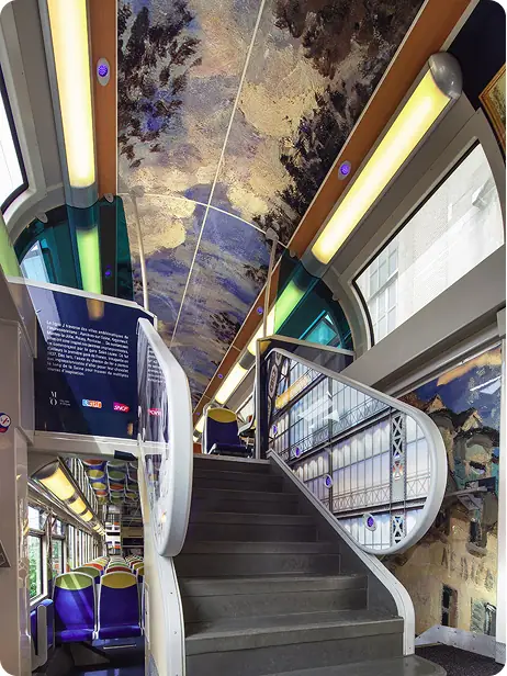 Stairwell of a double-deck carriage with a painted ceiling